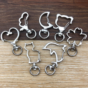Ganchos para llaveros de aleación de plata de formas variadas para accesorios de joyería DIY, paquete de 12 unidades. - Product Image 3