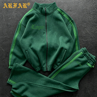Fabricants de vêtements pour femmes : Ensemble décontracté 2 pièces (veste à rayures latérales et pantalon de jogging) avec logo personnalisé – Collection 2026