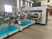 Machine automatique de pliage et de collage de boîtes en carton