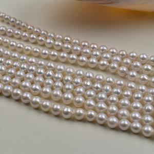 Collier de perles d'eau douce naturelles Edison 10-11 mm rondes haut de gamme blanches semi-finies avec une forte luminosité et de légères imperfections - Product Image 4