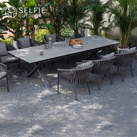 Ensemble de table à manger de jardin extensible en alliage d'aluminium moderne de luxe, résistant aux intempéries, avec plateau en pierre frittée, pour cour extérieure, hôtel