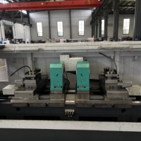 Tour CNC industriel automatique à double broche centrale 5 axes de conception nouvelle pour le traitement des pièces métalliques (perceuses/tubes/arbres)