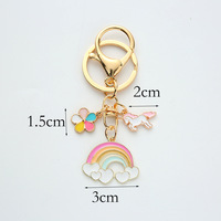 Nouveau alliage porte-clés mignon coloré fleur nuage arc-en-ciel métal clé pendentif créatif sac accessoires