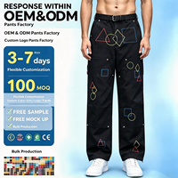 Pantalon cargo rétro brodé uni, coupe droite, avec boucle à la taille, formes géométriques, étiquette en cuir, poches obliques