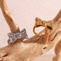 Offre Spéciale 18K Plaqué Or En Acier Inoxydable Bijoux De Fiançailles Micro Insert Zircon Arc Chevalière Anneau De Mode Bijoux Anneaux pour Femmes