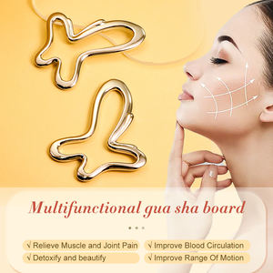 Outil de massage multifonctionnel en forme de papillon en métal <span class=keywords><strong>creux</strong></span> Gua Sha pour le visage et le <span class=keywords><strong>corps</strong></span> - Product Image 2