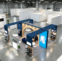 Stand d'exposition 6x6m facile à monter, avec impression personnalisée sur tissu tendu, présentoir à vêtements et table de négociation