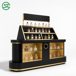 Mostrador de exhibición de perfumes negro y dorado con vitrina escalonada inclinada y estantes de vidrio para boutique de belleza - Product Image 4