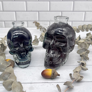 Botella <span class=keywords><strong>de</strong></span> cristal <span class=keywords><strong>de</strong></span> <span class=keywords><strong>calavera</strong></span> <span class=keywords><strong>de</strong></span> <span class=keywords><strong>forma</strong></span> única, 190Ml, transparente, vacía <span class=keywords><strong>con</strong></span> tapón <span class=keywords><strong>de</strong></span> polímero para licor, ron, ginebra, Tequila, whisky, Brandy, <span class=keywords><strong>Vodka</strong></span> - Product Image 1