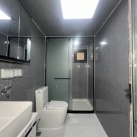 Maison conteneur extensible moderne de luxe de 40 pieds avec cadre noir et jaune désert, étanche et résistante au vent, pour usage hôtelier