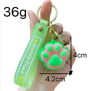 Vente en gros de porte-clés lumineux en forme de patte de chat pour la décompression - Product Image 6