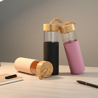 Bouteille d'eau en verre transparent de 550 ml de haute qualité, personnalisée en usine, avec couvercle en bambou et manchon en silicone