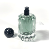 Bouteille d'atomiseur d'huile essentielle de cylindre de forme plate transparente transparente de 100ml avec le chapeau sphérique pour l'emballage d'épices de jet de brouillard
