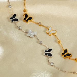 Niche <span class=keywords><strong>japonaise</strong></span> <span class=keywords><strong>et</strong></span> coréenne Design Fashion Ornements en acier inoxydable <span class=keywords><strong>Noir</strong></span> <span class=keywords><strong>Blanc</strong></span> Mère Shell Papillon avec diamant intégré - Product Image 2