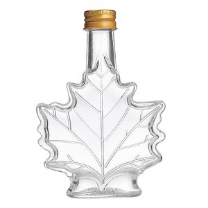 Bouteille de sirop en verre en forme de feuille d'<span class=keywords><strong>érable</strong></span> 50ml 100ml 250ml Bouteille de liqueur en verre avec bouchon <span class=keywords><strong>à</strong></span> vis pour <span class=keywords><strong>l</strong></span>'emballage de spiritueux Vodka - Product Image 1