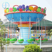 Manège pour enfants en forme de pastèque, chaise volante à thème de parc d'attractions, équipement de divertissement