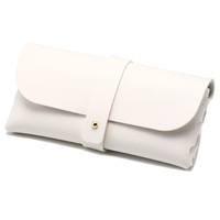 Nouvelle mode, sac de voyage portable haut de gamme, personnalisé, en cuir, avec bouton, sac souple en PU, étui de rangement pour lunettes de soleil, blanc, noir, Huicheng