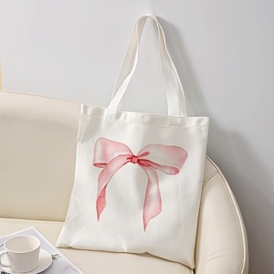 Sacs fourre-tout en toile épaisse de 16 oz, réutilisables, en coton, style minimaliste, avec nœud rose festif et longue bandoulière, pour la vente en gros - Product Image 2