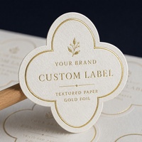 Autocollants en papier texturé personnalisés avec feuille métallique pour l'emballage de boutiques