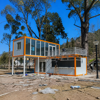 Maison préfabriquée en acier avec terrasse et escalier pour kiosque, café ou boutique de détail