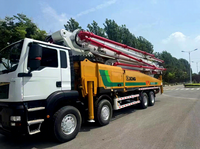 Pompe à béton diesel d'occasion fiable montée sur camion avec une portée verticale de 62 m et une production de 170 m³/h pour les projets de construction de bâtiments de grande hauteur