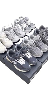 Zapatillas Deportivas para Hombre 2002R, Tejidas, Modernas, Casuales, con Malla Transpirable, Ligeras y Antideslizantes, Directo de Fábrica - Product Image 1