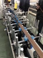 Machine de laminage et d'enrobage pour le travail du bois, meubles, portes en bois, fenêtres, MDF, placage PVC, papier, colle thermofusible, colle froide