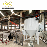 Le noyau d'alimentation en spirale du séchoir vertical hybride comprend un moteur de boîte de vitesses portant des produits chimiques aliments hôtels vis pompe doseuse à pression