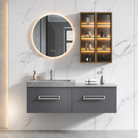 Meuble-lavabo mural gris moderne avec vasque et miroir LED rond pour projets hôteliers et d'appartements