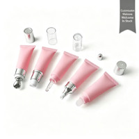 Tube cosmétique en plastique rose givré 10g 20g pour crème contour des yeux et rouge à lèvres avec capuchon applicateur massant en céramique