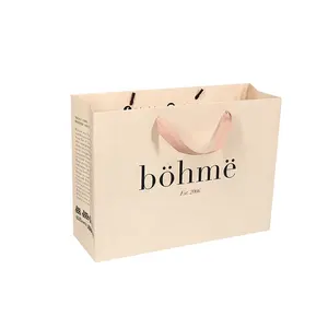 Bolsa de papel personalizada de cartón con revestimiento laminado mate de lujo con logotipo