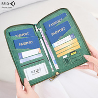 Portefeuille de voyage minimaliste et élégant avec blocage RFID pour passeport et cartes de crédit, avec rangement pour billets de voyage et cartes de visite (matériau PU)