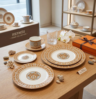 Service de table de luxe en porcelaine fine H Bone China avec assiettes de présentation en céramique orange, tasses à café et bols pour événements de mariage