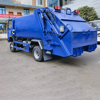 Camion compacteur de déchets ISUZU 4x2 de haute qualité |   Camion de compression des déchets durable pour l'exportation