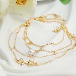 Tobilleras ZYO Personalizadas, Impermeables, de Moda Veraniega, Chapadas en Oro, con Perlas, Colgante de Estrella, Doble Capa, Lazo y Borlas - Product Image 4
