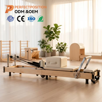 Lit de Pilates pliable en érable pour entraînement professionnel en studio, cadre en bois, logo personnalisé