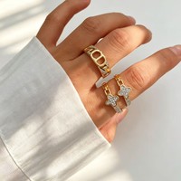 Ensemble de bracelets tendance avec chaîne cubaine, quatre fleurs et zircone, plaqué cuivre or 18 carats, style empilable, vente en gros