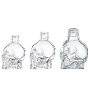 Holesale-botella de aceite esencial con gotero de cristal en forma de Calavera, 10ml, 30ml, 50ml y 100ml