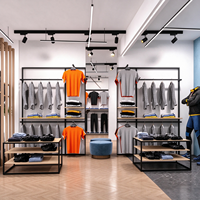 Portant à vêtements métallique robuste avec cadre noir, étagère en bois et tringle de suspension pour magasin de vêtements CE ETL Vente en gros