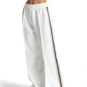 Pantalon de survêtement blanc pour femme, coupe large, taille élastique, avec bande latérale, décontracté, pour la détente, printemps, coupe ample, longueur intégrale, en maille - Product Image 1