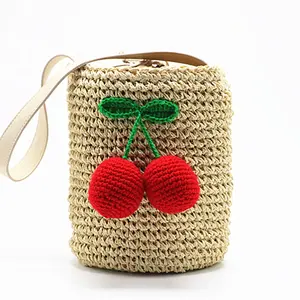 Bolso de mano de paja para mujer, tejido de paja de ganchillo, estilo cereza, bolso de mano para viajar con pompones, Cubo de Corea