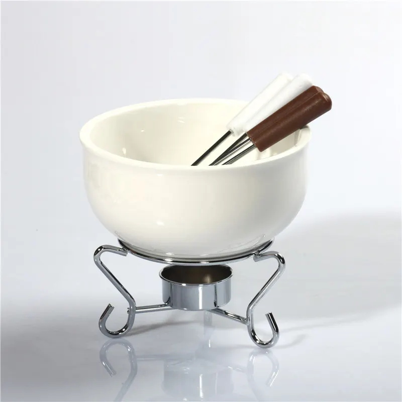 Weißes Keramik topf schokoladen schmelzendes Käse fondue