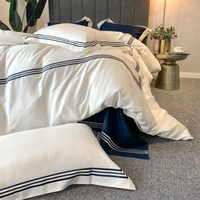 Ensemble de linge de lit de luxe pour hôtel 5 étoiles personnalisé 300TC 60s drap de lit King Size brodé en satin de coton à longues fibres pour usage domestique