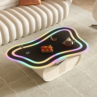 Table basse élégante et moderne pour salon, avec éclairage tactile intelligent, musique intégrée, forme papillon et fonctions auxiliaires