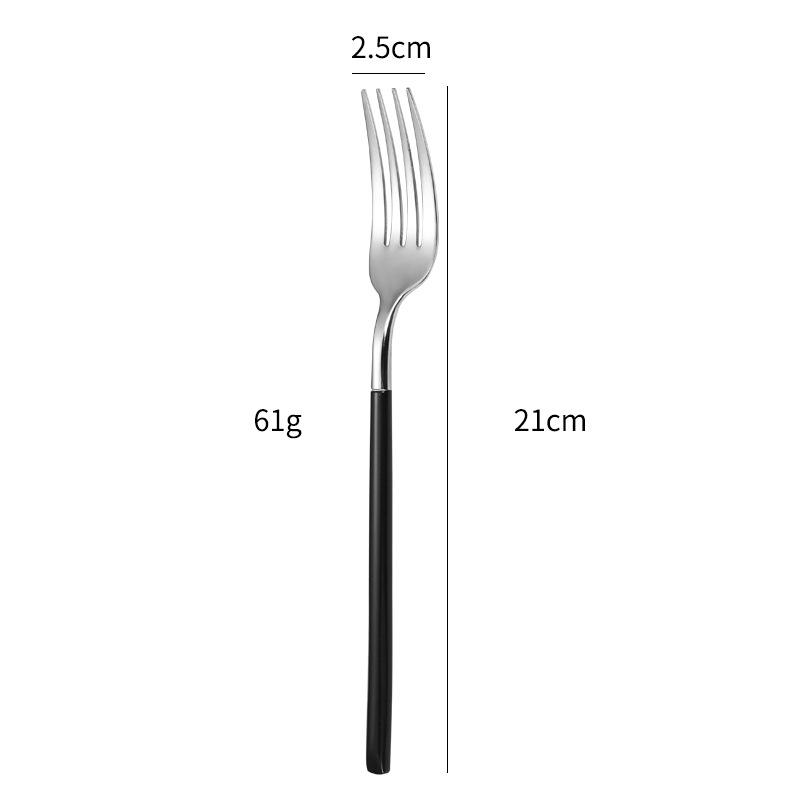 Fourchette de table noire et argentée