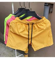 Short de plage surdimensionné avec logo personnalisé pour hommes, décontracté, motif uni, polyester, course à pied et maillots de bain avec étiquette imprimée brodée
