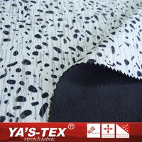 Tissu spandex en polyester imprimé à pois réfléchissants avec polaire en graphène tissé et membrane TPE pour vestes et textiles de sacs