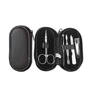 Juego de cortaúñas de belleza de viaje de recuerdo de acero inoxidable negro de 5 piezas Kit de cuidado de <span class=keywords><strong>manicura</strong></span> <span class=keywords><strong>y</strong></span> <span class=keywords><strong>pedicura</strong></span> personal - Product Image 1