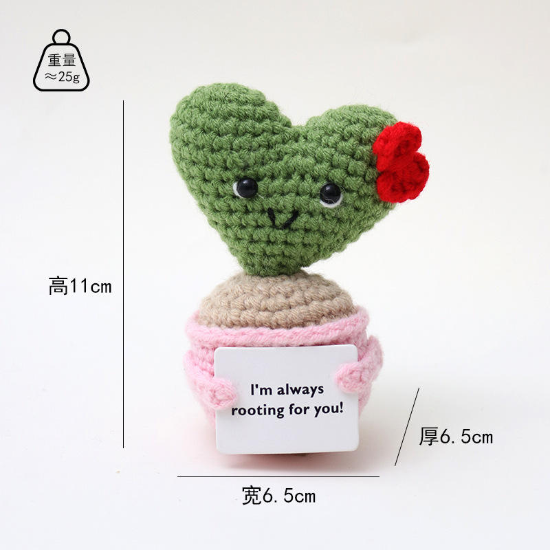 Coeur vert portant une fleur rouge, plante en pot rose