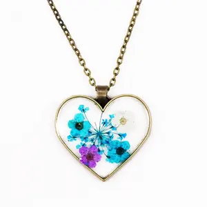 Fashion jewelry vintage heart bezel bronze tone stainless steel chain natural dried flower resin pendant necklace